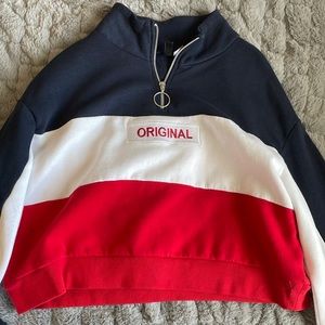 “original” printed cropped crewneck in the colors red, white, and blue
